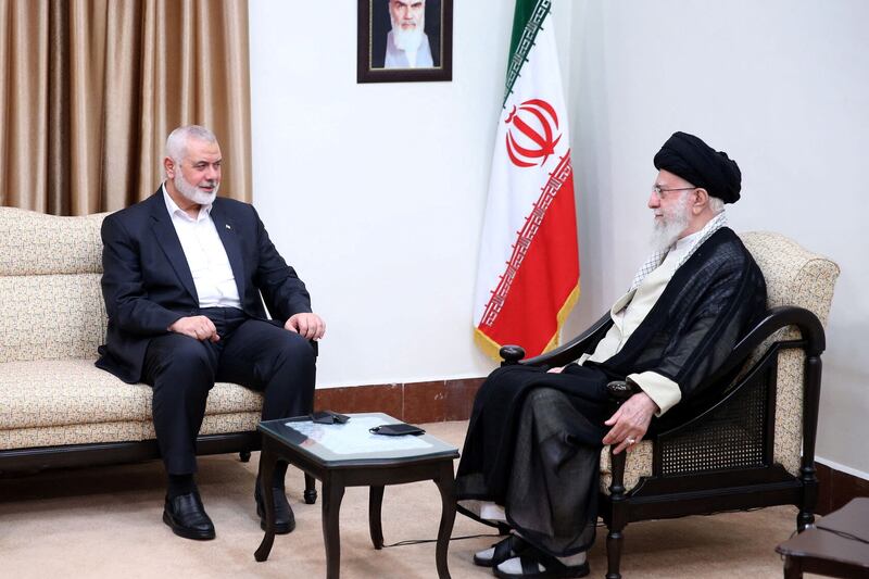 Iran's Supreme Leader Ayatollah Ali Khamenei meets with Hamas' top leader Ismail Haniyeh