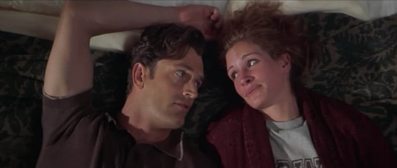Rupert Everett appears with Julia Roberts in a scene from the 1997 film “My Best Friend’s Wedding.”
