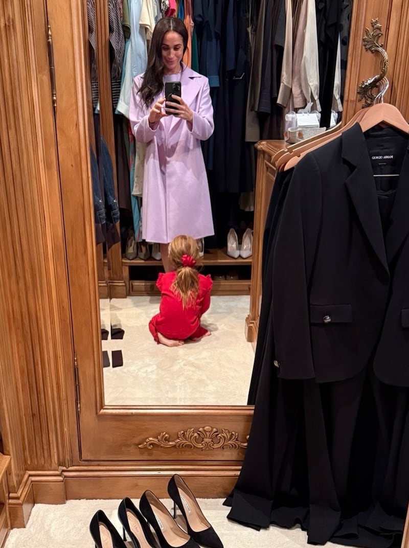 Meghan Markle shares a candid photo of herself getting ready with her daughter, Princess Lilibet, in a 2026 Instagram post, without showing her face.