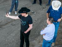 Elon Musk, wearing a black Stetson hat, livestreaming while visiting the Texas-Mexico border