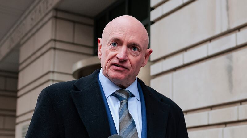 WASHINGTON, DC - FEBRUARY 03: Sen. Mark Kelly (D-AZ) speaks after departing federal court on February 03, 2026 in Washington, DC. Kelly is suing U.S. Secretary of War Pete Hegseth, asking a federal court to vacate the Pentagon chief's letter censuring the Arizona Democrat and moving to lower his military retirement rank. (Photo by Heather Diehl/Getty Images)