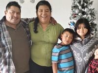 Denisse Parra Vargas with her children.