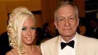 Playboy's Hugh Hefner (R) and girlfriend Playmate Kendra Wilkinson depart the 34th AFI Life Achievement Award tribute to Sir Sean Connery held at the Kodak Theatre on June 8, 2006 in Hollywood, California.