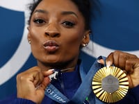 Simone Biles seemingly trolled Donald Trump in a post saying: “I love my Black job.”