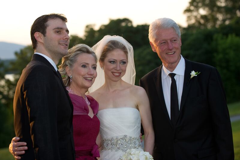 Marc Mezvinsky, U.S. Secretary of State Hillary Clinton, Chelsea Clinton and former U.S. President Bill Clinton pose during the wedding of Chelsea Clinton and Marc Mezvinsky at the Astor Courts Estate on July 31, 2010 in Rhinebeck, New York.