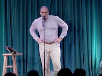 David Rancourt speaks during a comedy routine.