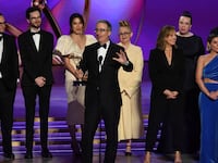 John Oliver accepts the Outstanding Scripted Variety Series award for “Last Week Tonight with John Oliver” onstage during the 76th Emmy Awards.