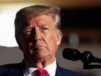 Former U.S. President and Republican presidential candidate Donald Trump reacts as he holds a campaign rally in Erie, Pennsylvania.