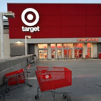The exterior of a Target store in Los Angeles, California before the start of business on August 17, 2022. US retail sales held steady in July as gas prices fell sharply, but the new data released Wednesday by the Commerce Department showed consumers are still spending, keeping the pressure on the Federal Reserve to continue its aggressive interest rate hikes. (Photo by Robyn Beck / AFP) (Photo by ROBYN BECK/AFP via Getty Images)