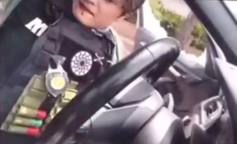 A still image from the alleged San Diego mosque shooters' livestream footage moments before Cain Clark, 17, shoots his accomplice Caleb Velasquez, 18, and turns the gun on himself.