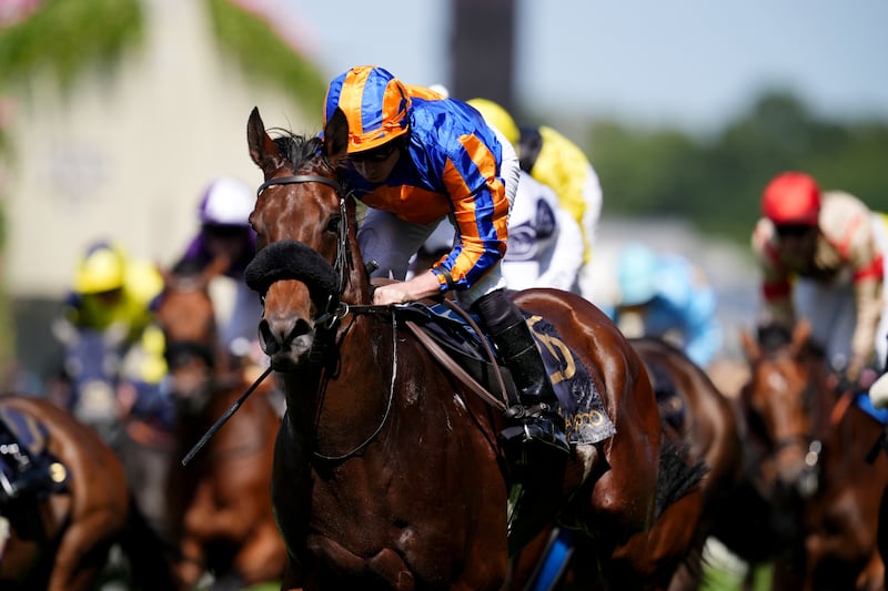 Mission Central, a horse ridden by Ryan Moore, sprints to the finish line on the first day of Royal Ascot at Ascot Racecourse.