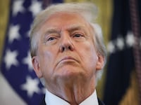 WASHINGTON, DC - AUGUST 07: U.S. President Donald Trump listens to questions from reporters after speaking on economic data in the Oval Office on August 07, 2025 in Washington, DC. Trump fired Bureau of Labor Statistics Commissioner Dr. Erika McEntarfer on August 1st, claiming the agency issued “phony” jobs numbers during the Biden administration to aid Democrats. (Photo by Win McNamee/Getty Images)