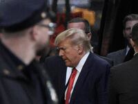 Former U.S. President Donald Trump and his son Eric Trump arrive at Trump Tower