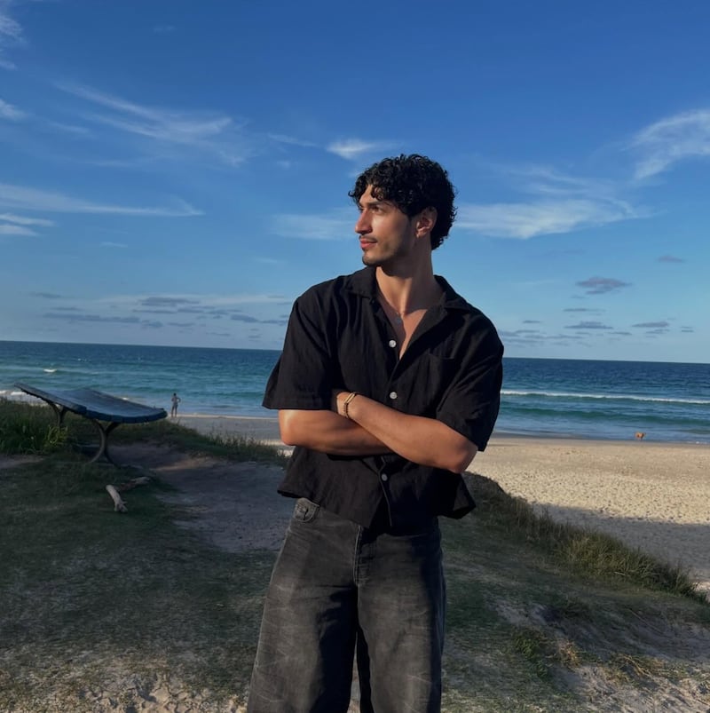 Love Island star Zach Georgio poses for a 2026 photo by the ocean on his Instagram.
