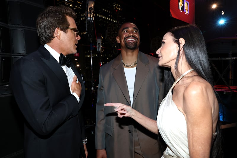 NEW YORK, NEW YORK - APRIL 24: (L-R) Ryan Reynolds, Demi Moore and Jalen Hurts attend the 2025 TIME100 Gala at Jazz at Lincoln Center on April 24, 2025 in New York City. (Photo by Kevin Mazur/Getty Images for TIME)