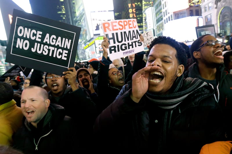 articles/2014/12/03/after-free-pass-for-eric-garner-killer-is-nyc-the-next-ferguson/141203-garner-protest1_asyb5q