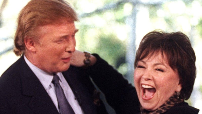 Donald Trump embraces Roseanne Barr in 1998.