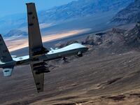 An MQ-9 Reaper remotely piloted drone aircraft performs aerial maneuvers