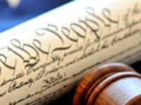 articles/2009/02/17/an-argument-against-legal-extremism/howard-legal-extremism-lawsuits_14409_f1ueqe