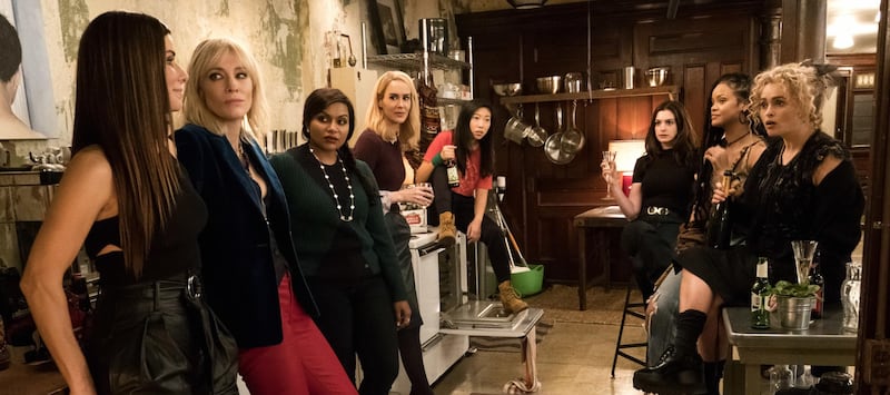 Anne Hathaway in "Ocean's 8" with cast members Sandra Bullock, Cate Blanchett, Mindy Kaling, Sarah Paulson, Awkwafina, Rihanna, and Helena Bonham Carter.