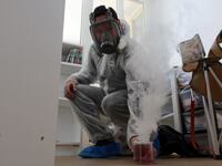 Sacha Krief treats an apartment against bedbugs in Paris, France