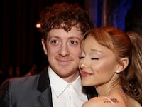 Ethan Slater and Ariana Grande are seen hugging at The National Board of Review Annual Awards Gala