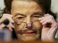 U.S. Senator Dianne Feinstein (D-CA) puts on her glasses during a Senate Judiciary Committee executive business meeting to vote on legislation and pending nominations before the committee, on Capitol Hill in Washington, U.S., May 11, 2023.