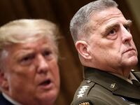 Mark A. Milley listens while US President Donald Trump speaks before a meeting