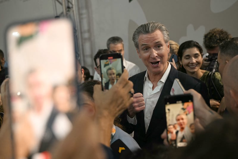 Governor of California Gavin Newsom speaks to journalists after a press conference during the COP30 UN Climate Change Conference