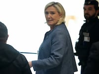 French far-right Leader Marine Le Pen leaves the courtroom after a guilty verdict in her embezzlement case trial on March 31, 2025 in Paris, France.