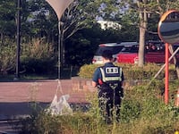 A balloon believed to have been sent by North Korea, carrying various objects including what appeared to be trash, is pictured at a park in Incheon, South Korea, June 2, 2024.