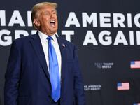 Republican presidential candidate and former U.S. President Donald Trump yells out to the crowd after he speaks at a campaign rally in Derry, New Hampshire