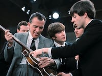 articles/2014/01/28/a-revolution-with-guitars-how-the-beatles-changed-everything/140127-tomasky-beatles-tease_dh1gky