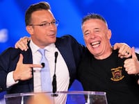 Right-wing political commentator and host of The Benny Show, Benny Johnson and former U.S. Border Patrol Chief Gregory Bovino attend the 2026 Conservative Political Action Conference (CPAC) in Grapevine, Texas, on March 26, 2026.