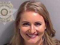 Jenna Ellis is shown in a police booking mugshot released by the Fulton County Sheriff’s Office in Atlanta, Georgia, Aug. 23, 2023.