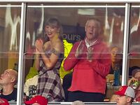 Taylor Swift and her father, Scott Swift, watch the NFL game between the Kansas City Chiefs and the New Orleans Saints at GEHA Field at Arrowhead Stadium on October 7, 2024 in Kansas City, Missouri.