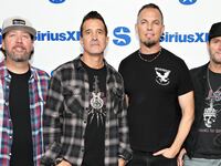 Scott Phillips, Scott Stapp, Mark Tremonti, Brian Marshall and Eric Friedman of Creed
