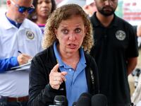 OCHOPEE, FLORIDA - JULY 12: Rep. Debbie Wasserman Schultz (D-FL), Rep. Darren Soto (D-FL) (L), and Rep. Maxwell Frost (D-FL) during a press conference after visiting "Alligator Alcatraz" at the Dade-Collier Training and Transition Airport on July 12, 2025, in Ochopee, Florida. Members of Congress were given their first visit to the new state-managed immigration detention facility in the Florida Everglades that officials have named “Alligator Alcatraz.” (Photo by Joe Raedle/Getty Images)