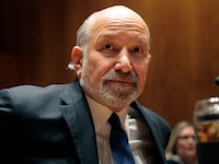 Commerce Secretary Howard Lutnick arrives to testify during a Senate subcommittee as he faces bipartisan calls to resign after new revelations came to light in the latest release of Epstein files.