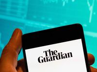 The Guardian logo on a smartphone.