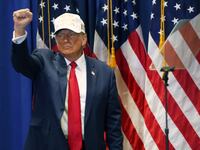 Donald Trump leaves a rally in Iowa.