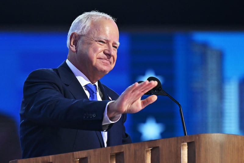Minnesota Governor and 2024 Democratic vice presidential candidate Tim Walz gestures as he speaks on the third day of the Democratic National Convention (DNC) at the United Center in Chicago, Illinois, on August 21, 2024.