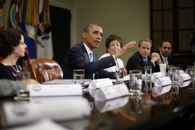 articles/2013/06/30/the-age-of-obama-a-strong-government-and-a-weak-america/130629-green-obama-tease_an90gh