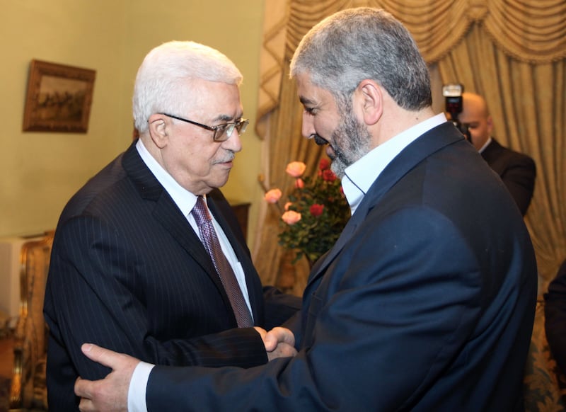 articles/2012/04/04/unify-the-palestinians-neutralize-hamas/abbas-meshal-hand-shake-openz_s9jd1g
