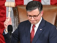 TOPSHOT - US Speaker of the House Mike Johnson, Republican from Louisiana, holds up the gavel after he won the vote for Speaker of the House, during the first day of the 119th Congress in the House Chamber at the US Capitol in Washington, DC, on January 3, 2025. (Photo by Mandel NGAN / AFP) (Photo by MANDEL NGAN/AFP via Getty Images)