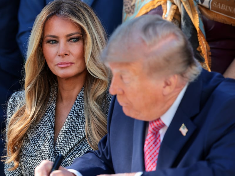 First lady Melania Trump watches as U.S. President Donald Trump signs an executive order in the Rose Garden of the White House on October 19, 2026 in Washington, DC. With the support and urging of the first lady, the executive order establishes the Women’s Health Division at the National Institutes of Health and a White House Women’s Health Task Force.