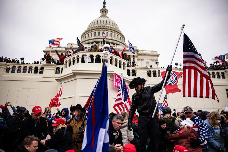 Supporters of Donald Trump attack the U.S. Capitol on January 6, 2021, in an attempt to interfere with the peaceful transfer of power.