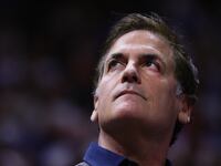 Mark Cuban looks upwadrds.