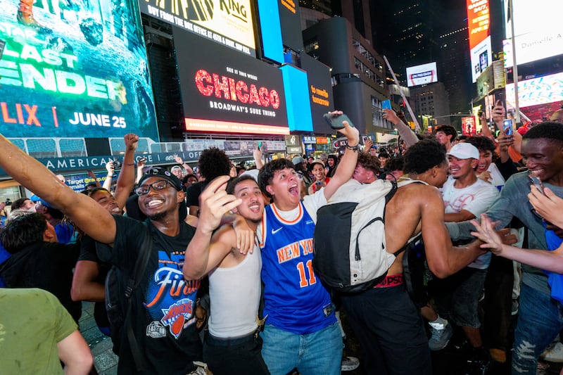 Knicks fans celebrating in Times Square