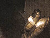A security-cam photo of Airbnb guest Shawn Mackey with an unidentified woman.